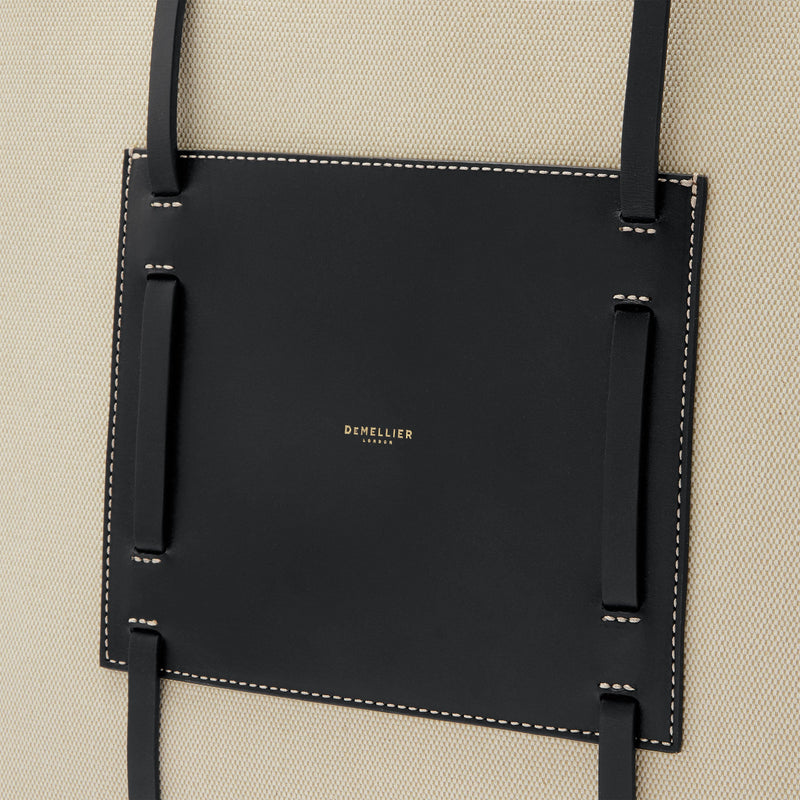 DeMellier The Large Capri salt & pepper canvas black smooth