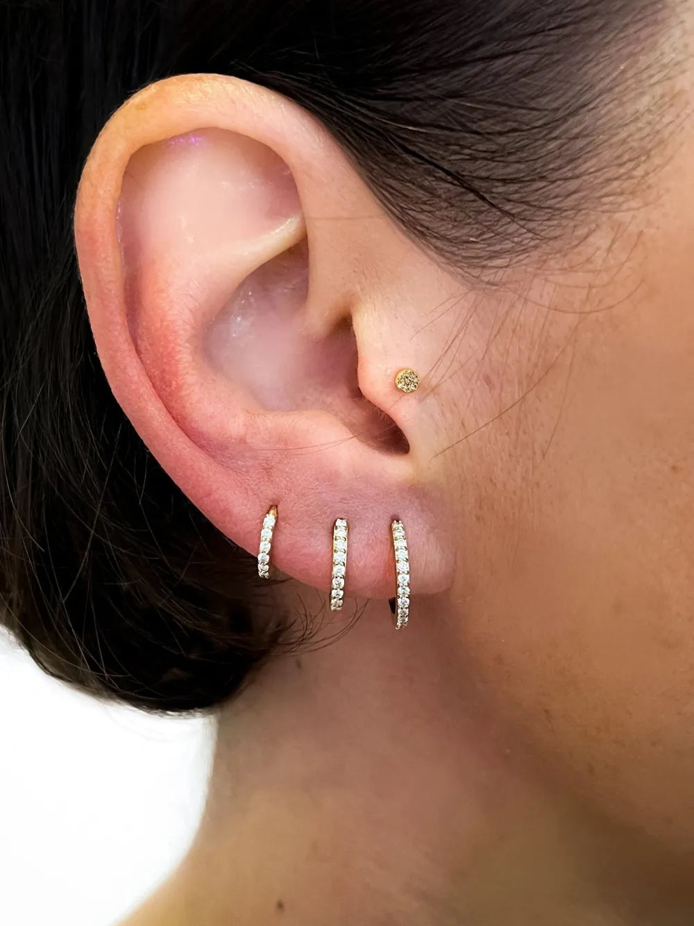 14kt yellow gold medium Modernist diamond hoop earring