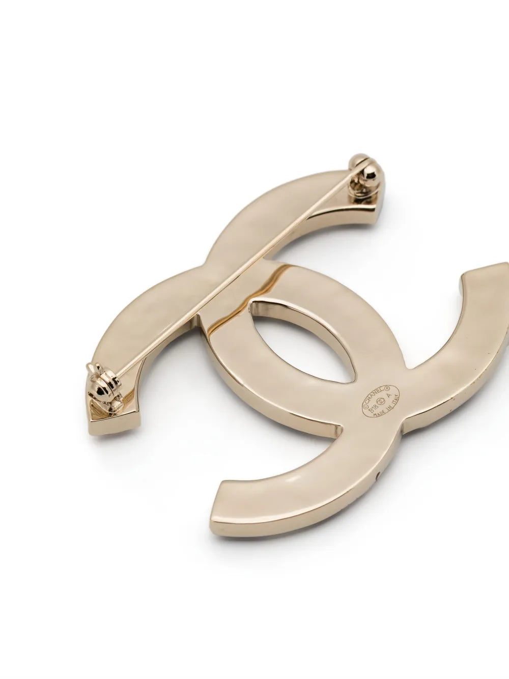 CC logo brooch
