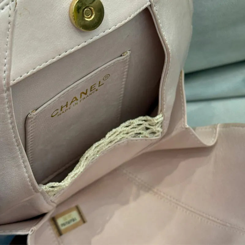 C531 - CHANEL Vintage Pale Pink Calfskin Camellia Wristlet Evening Bag