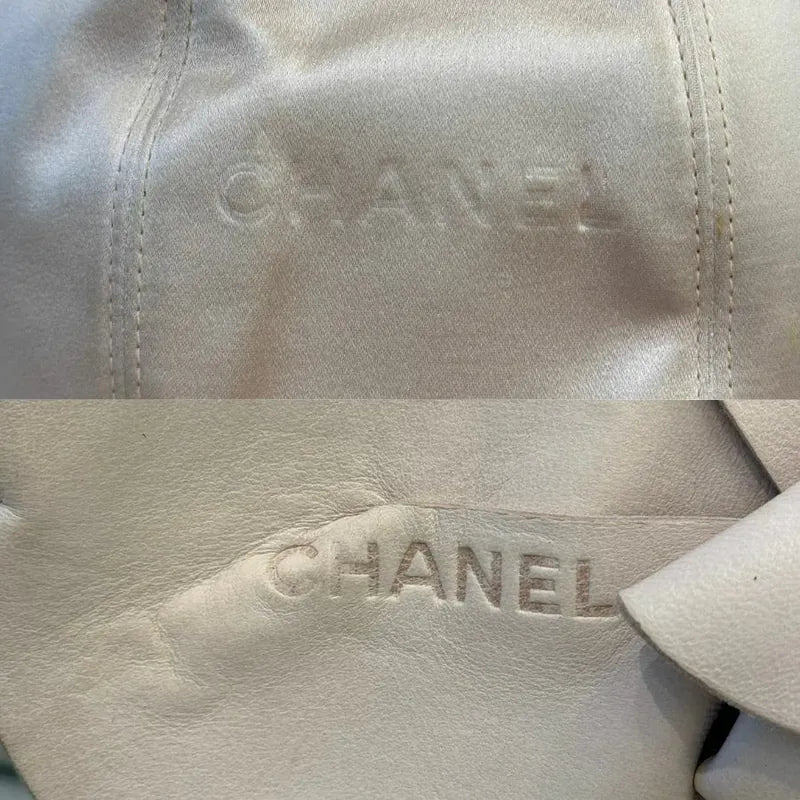 C531 - CHANEL Vintage Pale Pink Calfskin Camellia Wristlet Evening Bag
