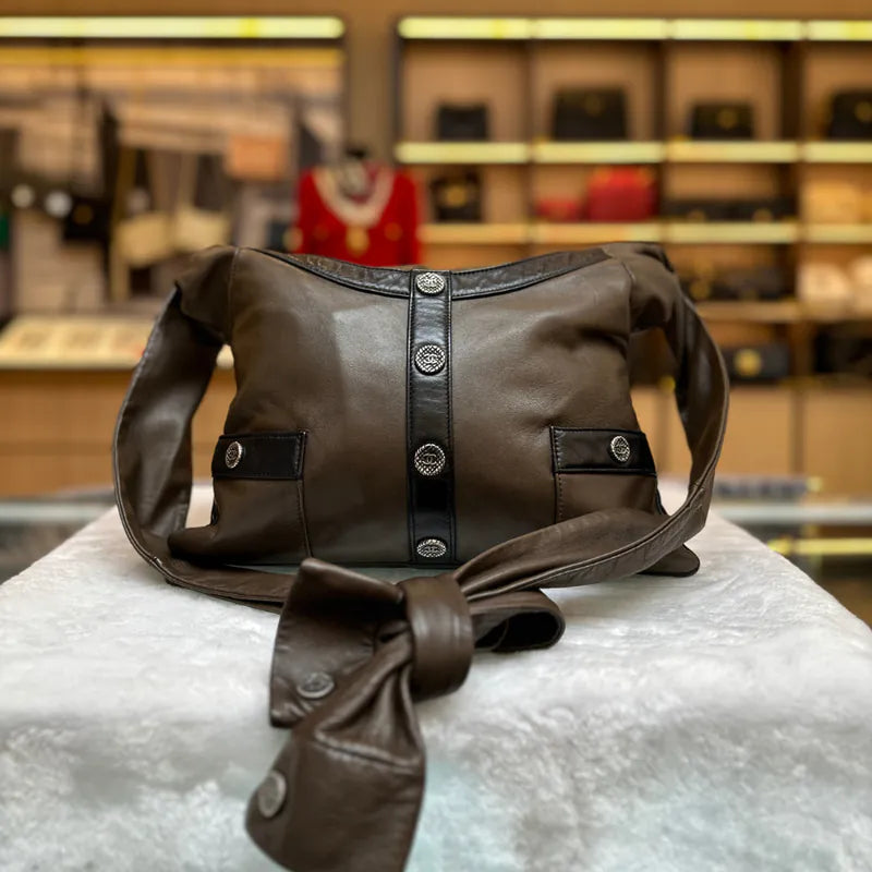 RB727 - CHANEL Vintage Girl Dark Brown Leather Bag