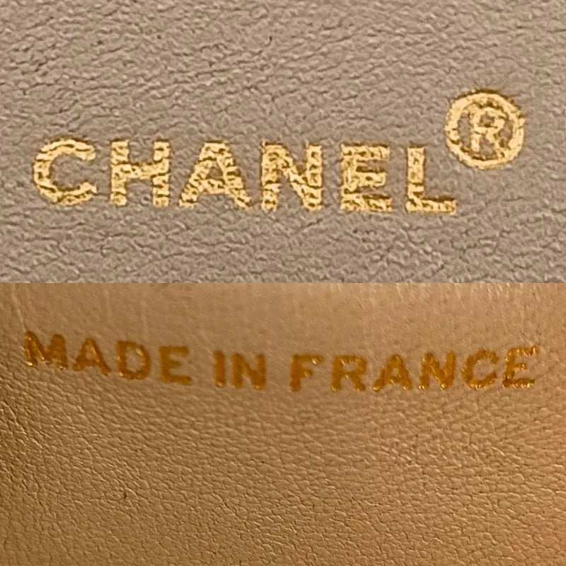 C469 - CHANEL Vintage Beige Lambskin 25cm Classic Flap Bag