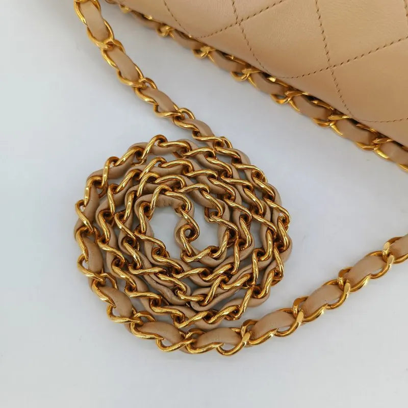 C469 - CHANEL Vintage Beige Lambskin 25cm Classic Flap Bag