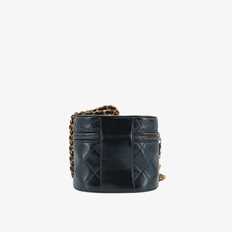 RA253 - CHANEL Vintage Black Lambskin Tassel Bucket Bag