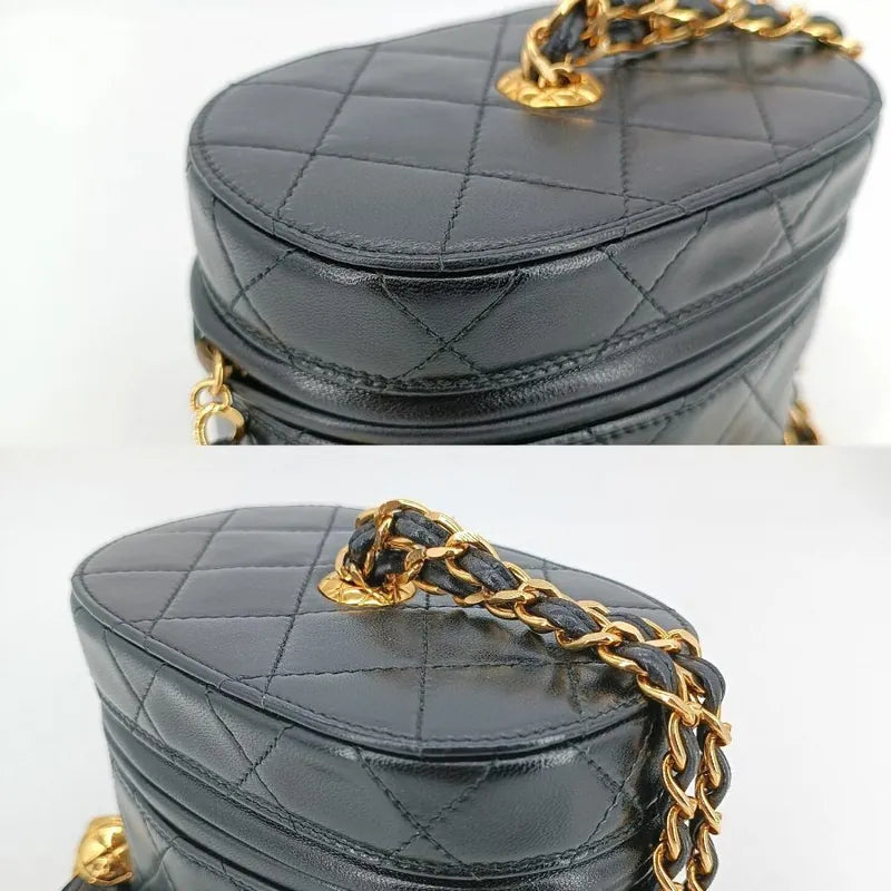 RA253 - CHANEL Vintage Black Lambskin Tassel Bucket Bag