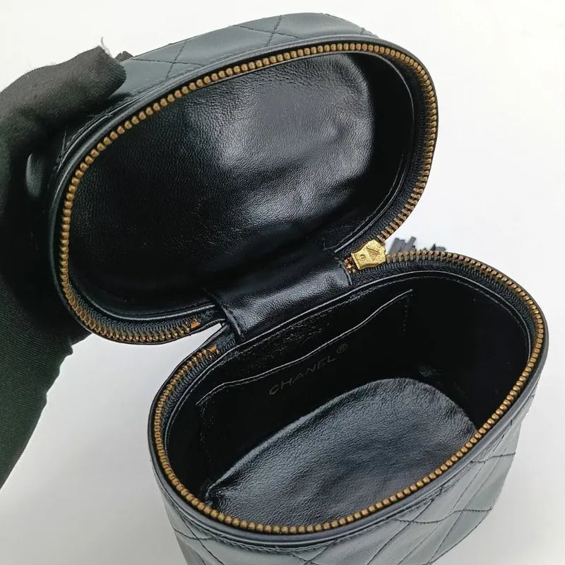 RA253 - CHANEL Vintage Black Lambskin Tassel Bucket Bag