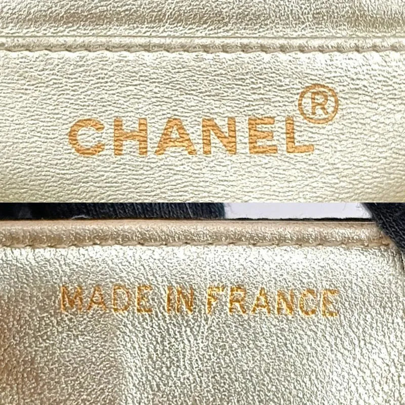 JT719 - CHANEL Vintage Black Satin Chevron Gold Chain Flap Bag