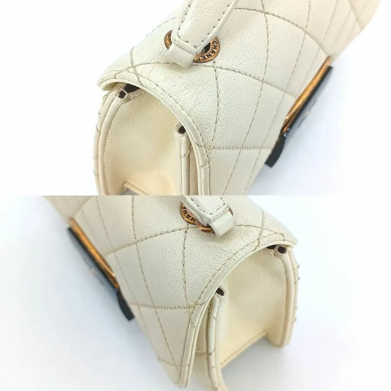 RA435 - CHANEL Beige Sheepskin Quilted Beauty Lock Mini Flap Bag