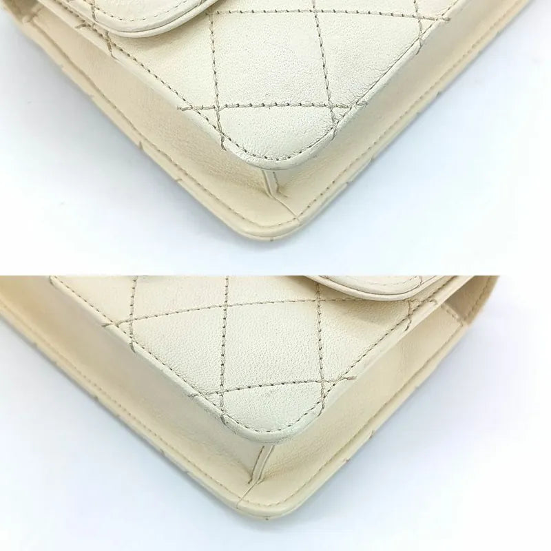 RA435 - CHANEL Beige Sheepskin Quilted Beauty Lock Mini Flap Bag