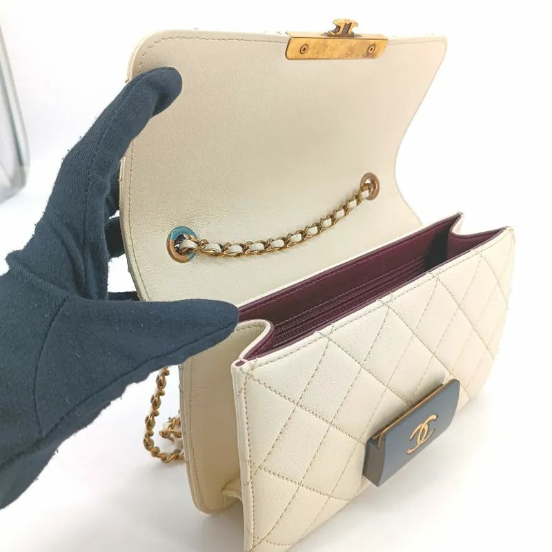 RA435 - CHANEL Beige Sheepskin Quilted Beauty Lock Mini Flap Bag