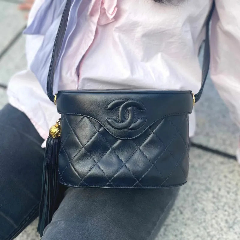 JT581 - CHANEL Vintage Navy Lambskin Tassel Vanity Case Bag