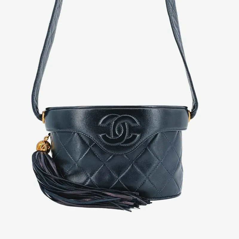 JT581 - CHANEL Vintage Navy Lambskin Tassel Vanity Case Bag