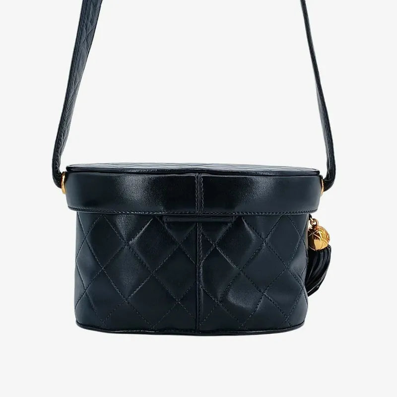 JT581 - CHANEL Vintage Navy Lambskin Tassel Vanity Case Bag