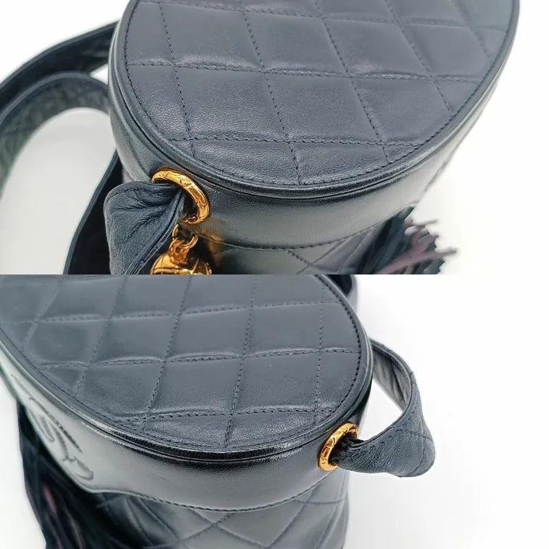 JT581 - CHANEL Vintage Navy Lambskin Tassel Vanity Case Bag