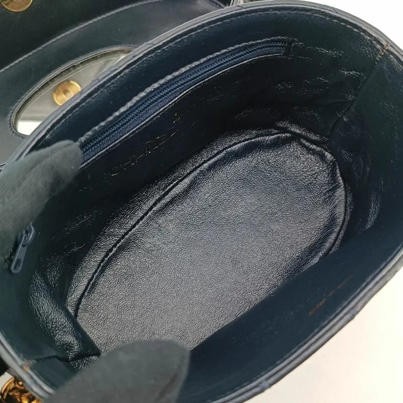 JT581 - CHANEL Vintage Navy Lambskin Tassel Vanity Case Bag