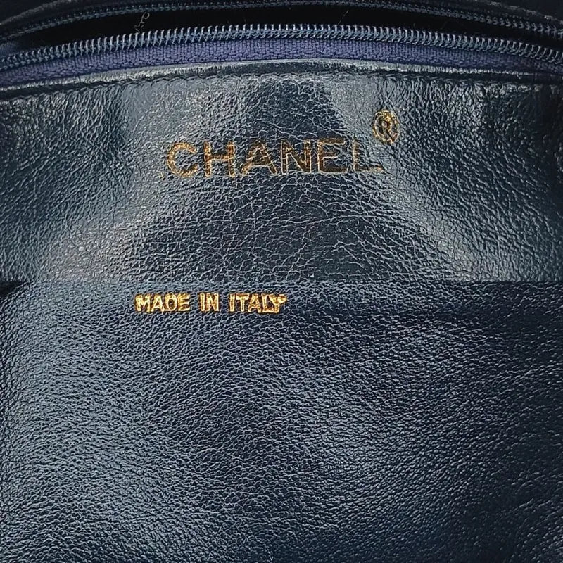 JT581 - CHANEL Vintage Navy Lambskin Tassel Vanity Case Bag