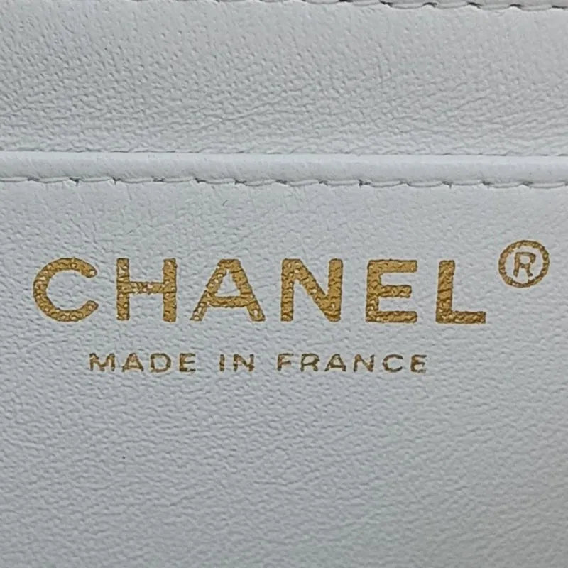 RA166 - CHANEL Vintage White Lambskin 25cm Flap Bag