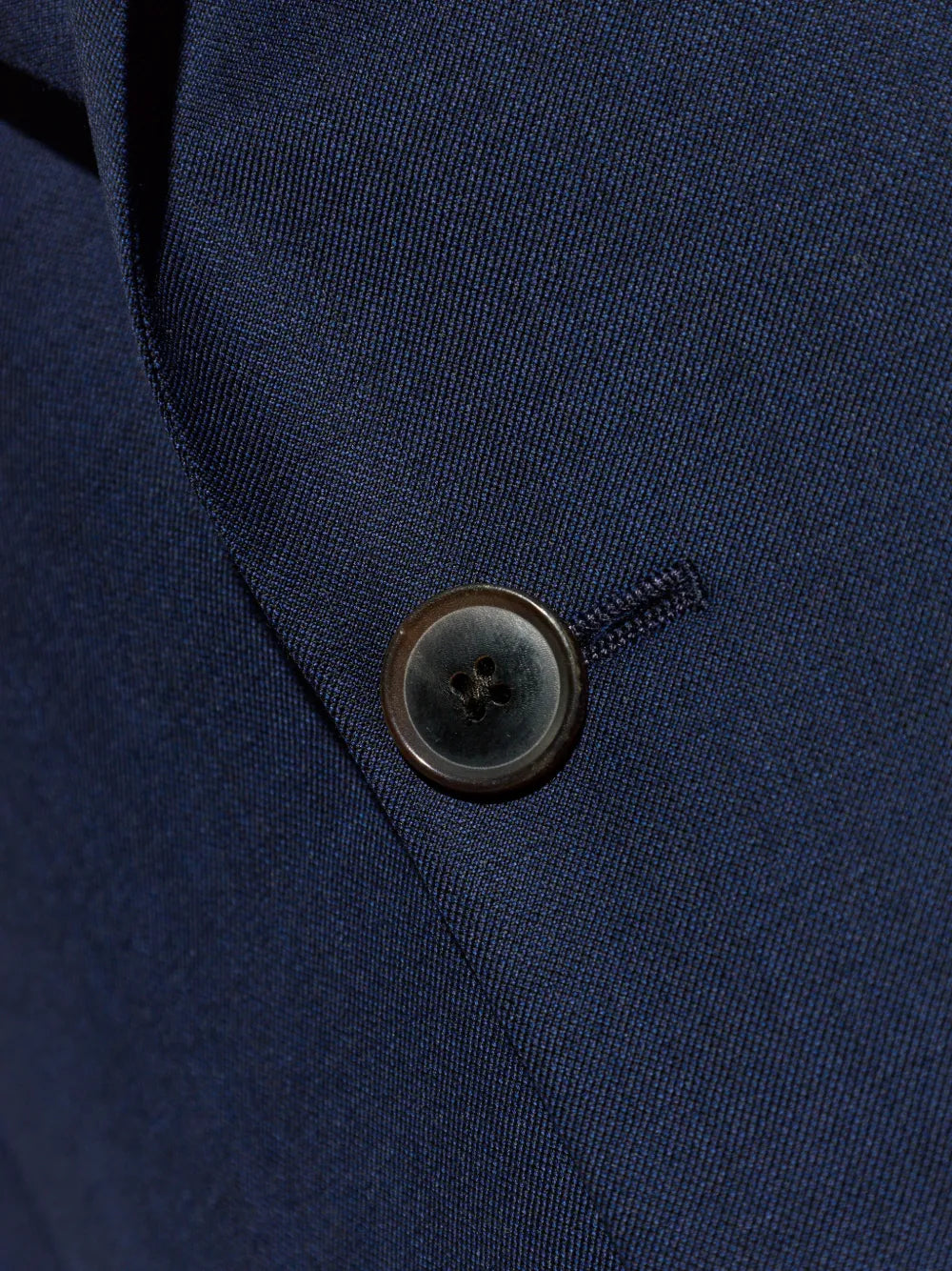 buttoned blue suit