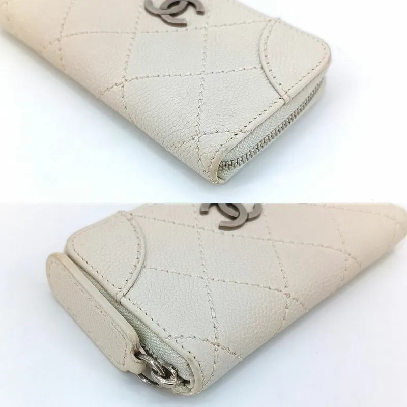 RA024 - CHANEL Vintage White Caviar Leather Zipped Coin Purse