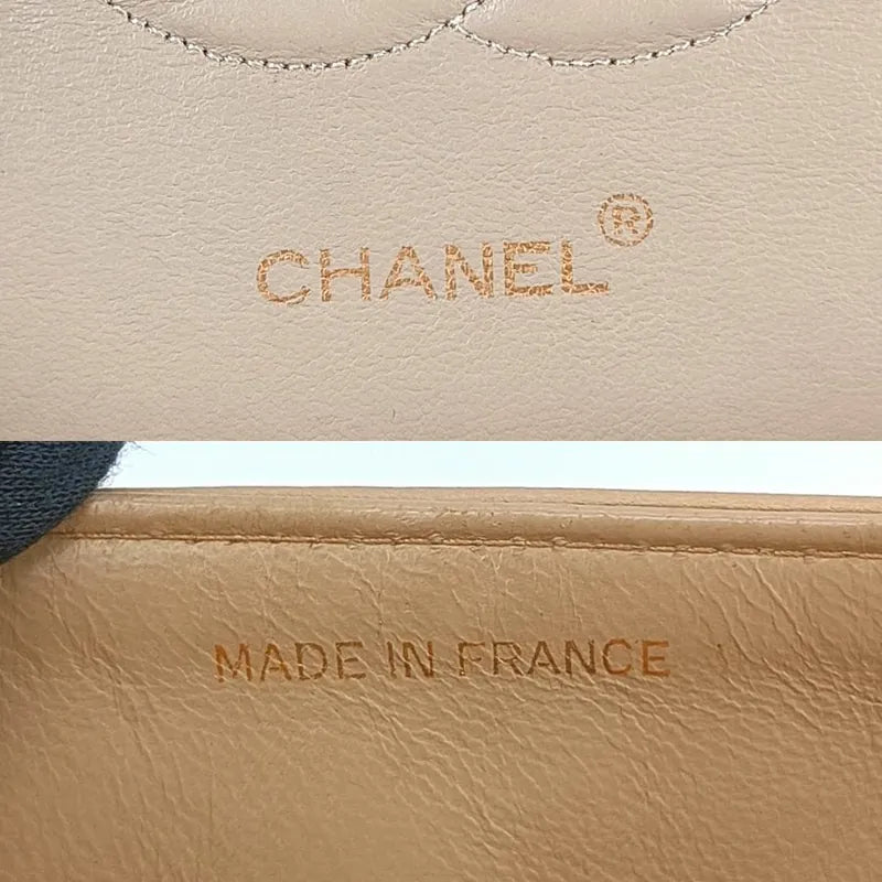 RA018 - CHANEL Vintage Beige Lambskin 25cm Classic Flap Bag