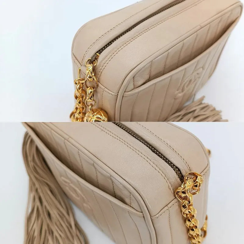 JT248 - CHANEL Vintage Beige Lambskin Tassels Gold Chain Camera Bag