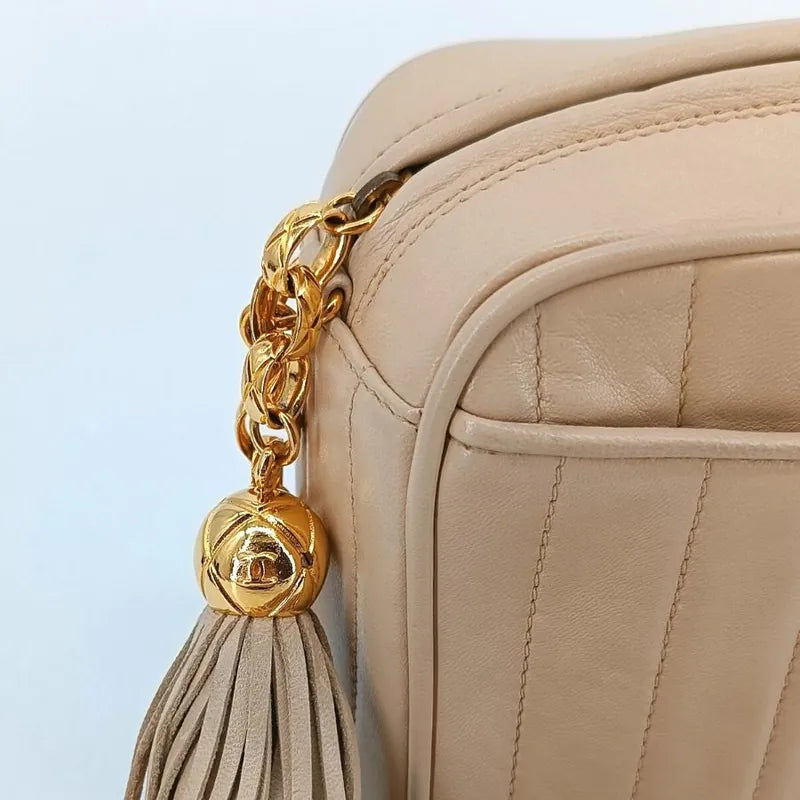 JT248 - CHANEL Vintage Beige Lambskin Tassels Gold Chain Camera Bag