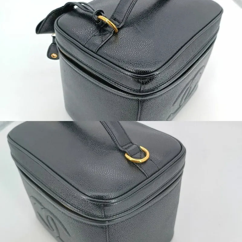 JS502 - CHANEL Vintage Black Caviar Embossed Logo Cosmetic Bag