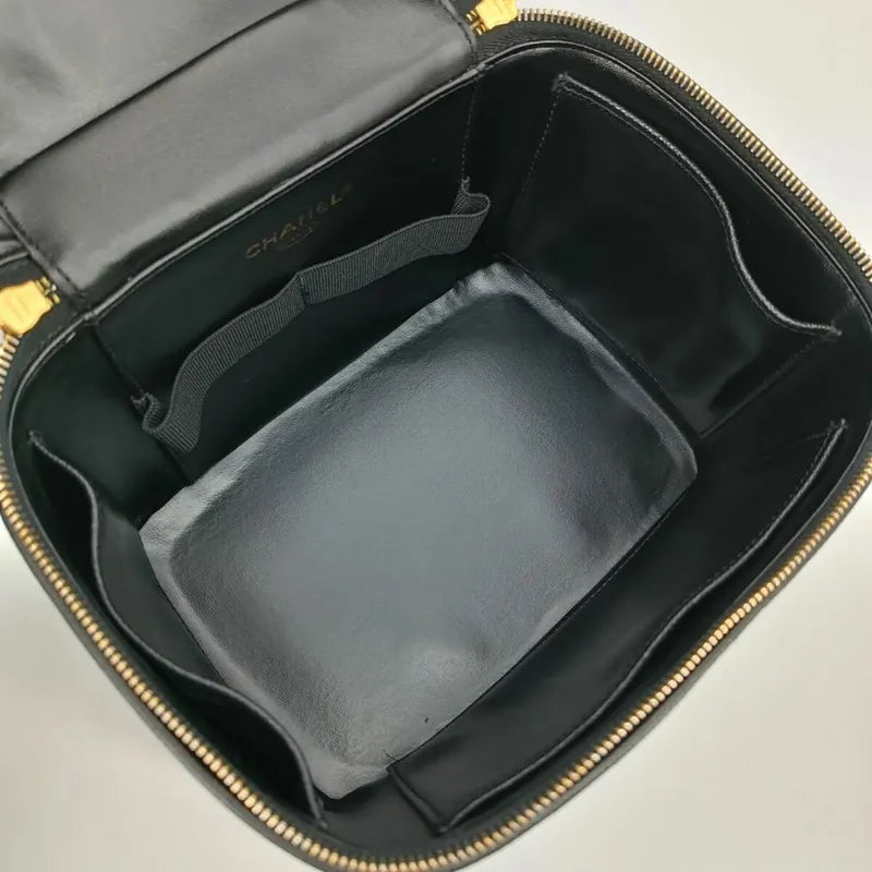 JS502 - CHANEL Vintage Black Caviar Embossed Logo Cosmetic Bag