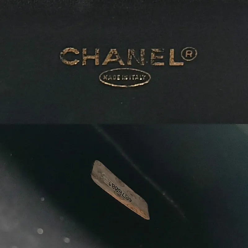 JS502 - CHANEL Vintage Black Caviar Embossed Logo Cosmetic Bag