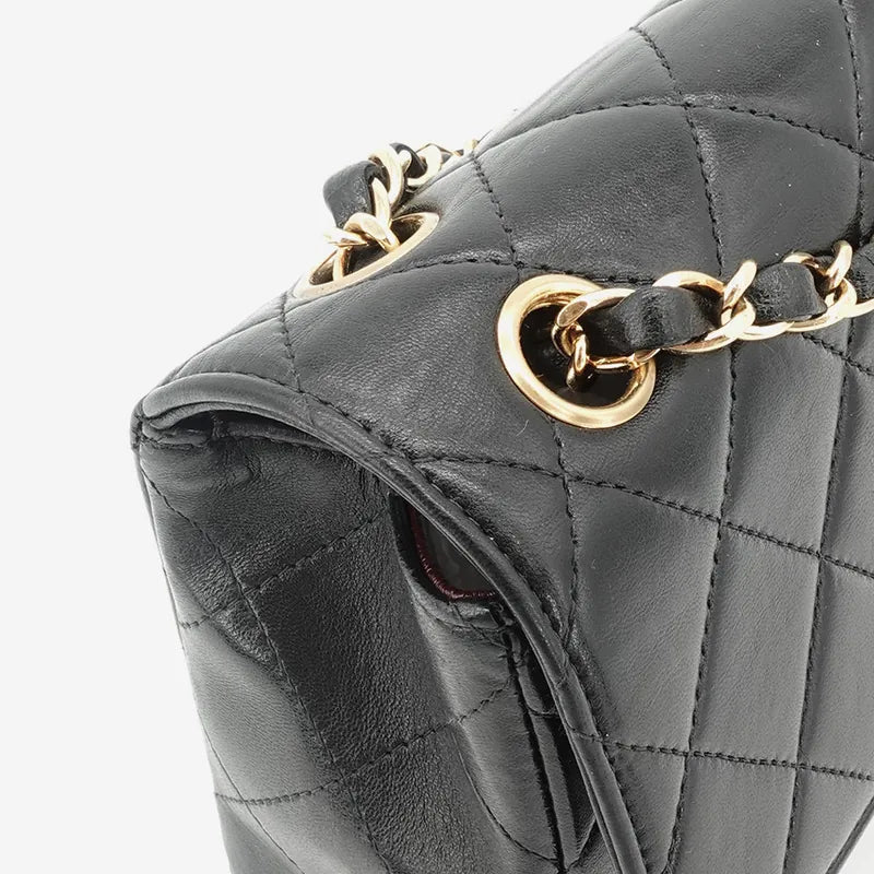 JQ455 - CHANEL Vintage Black Lambskin Shoulder Flap Bag