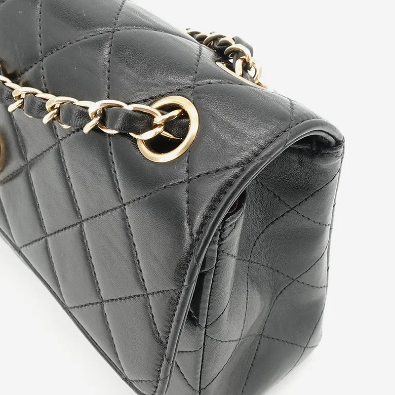 JQ455 - CHANEL Vintage Black Lambskin Shoulder Flap Bag
