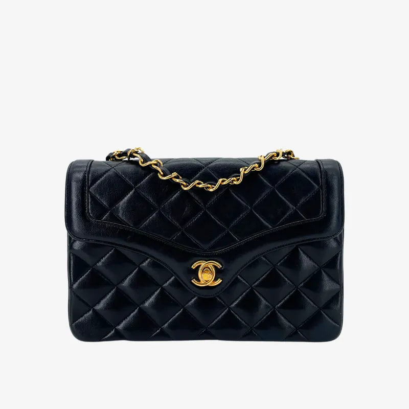 RA652 - CHANEL Vintage Black Lambskin Quilted Flap Bag