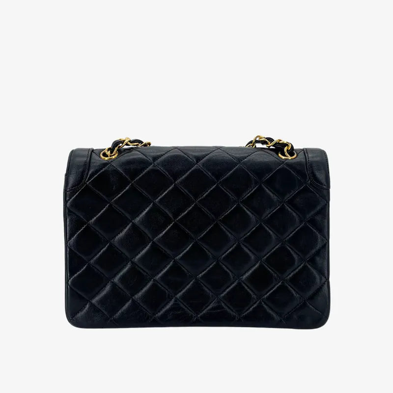 RA652 - CHANEL Vintage Black Lambskin Quilted Flap Bag