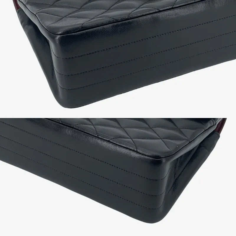 RA652 - CHANEL Vintage Black Lambskin Quilted Flap Bag
