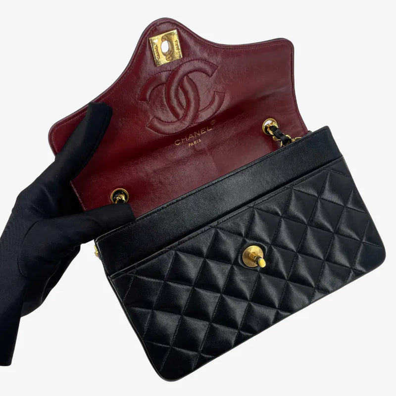 RA652 - CHANEL Vintage Black Lambskin Quilted Flap Bag