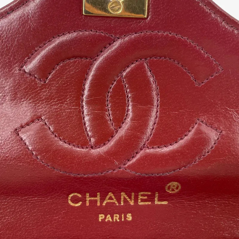 RA652 - CHANEL Vintage Black Lambskin Quilted Flap Bag