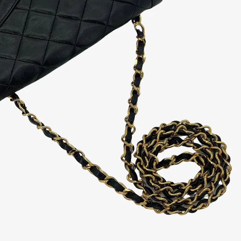 RA652 - CHANEL Vintage Black Lambskin Quilted Flap Bag