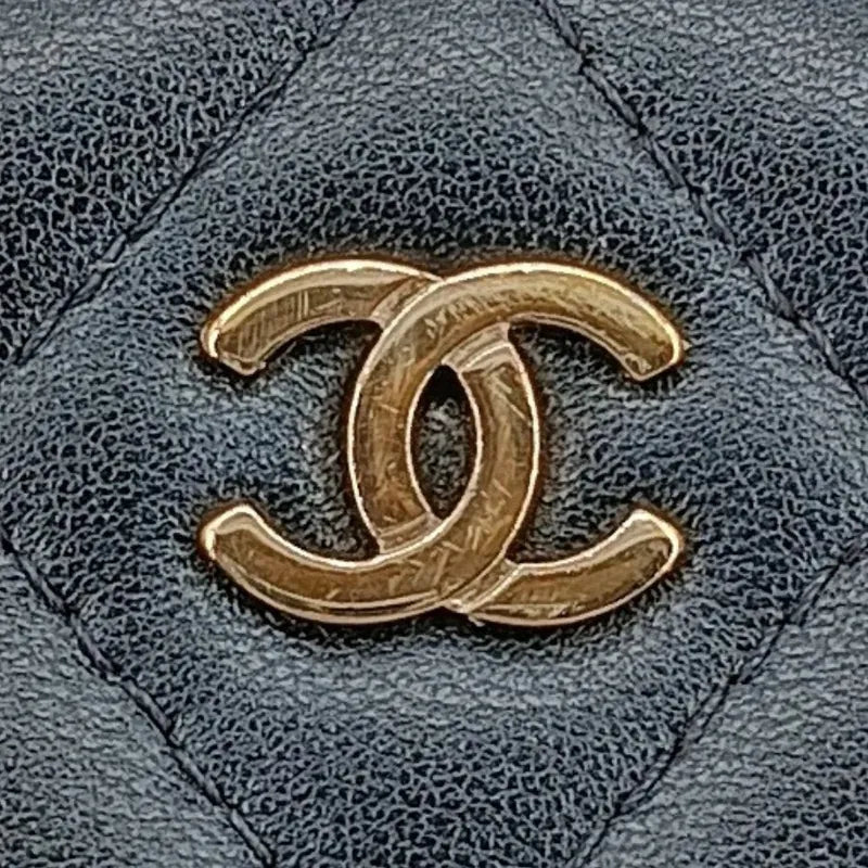 RA340 - CHANEL Black Lambskin Mini Vanity Case Bag