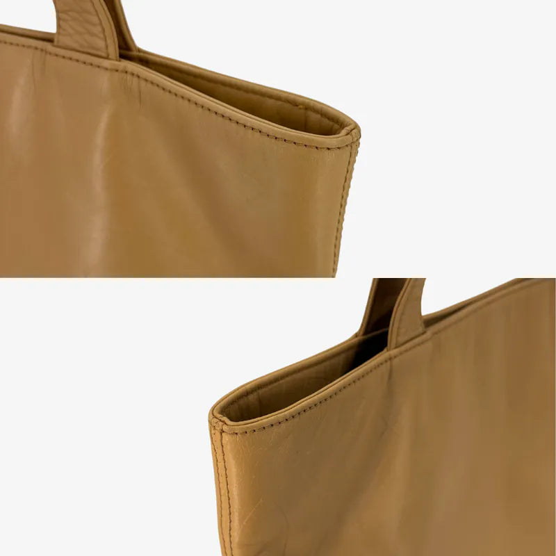 JY840 - CHANEL Vintage Beige Lambskin CC Embossed Tote Bag