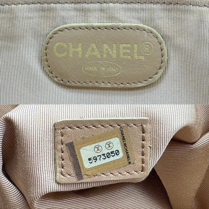 JY840 - CHANEL Vintage Beige Lambskin CC Embossed Tote Bag