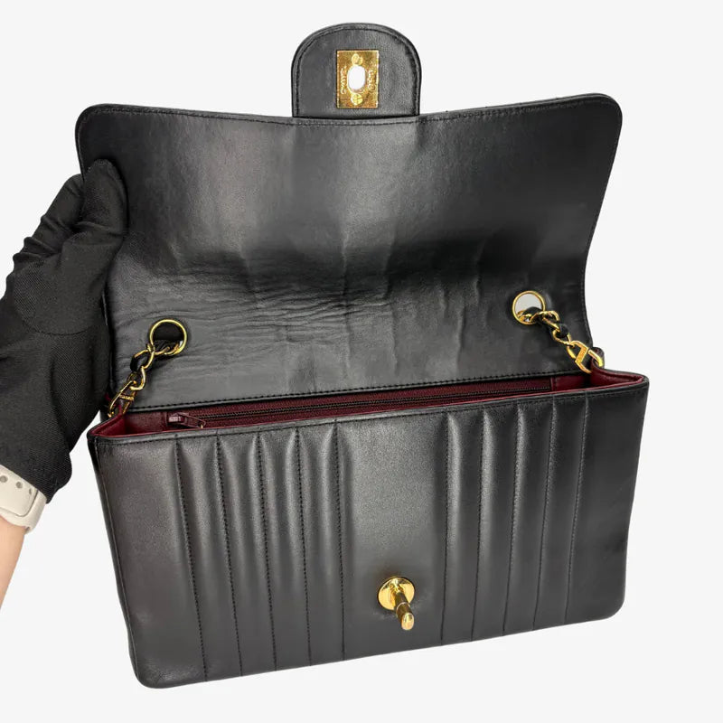 RG014 - CHANEL Vintage Black Lambskin Vertical Flap Bag