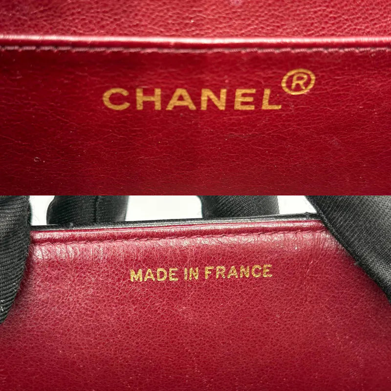 RG014 - CHANEL Vintage Black Lambskin Vertical Flap Bag