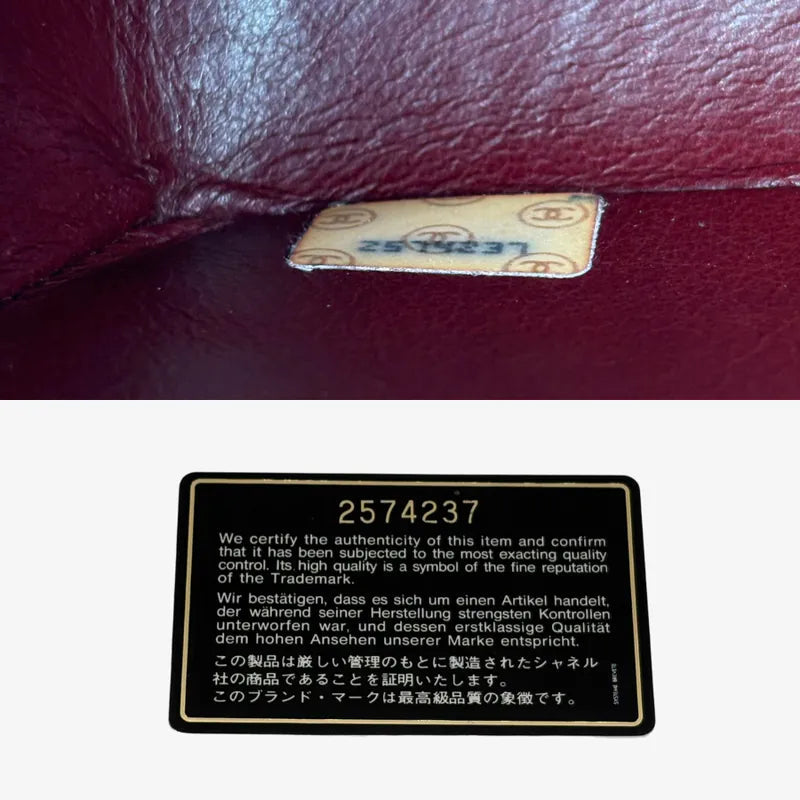 RG014 - CHANEL Vintage Black Lambskin Vertical Flap Bag