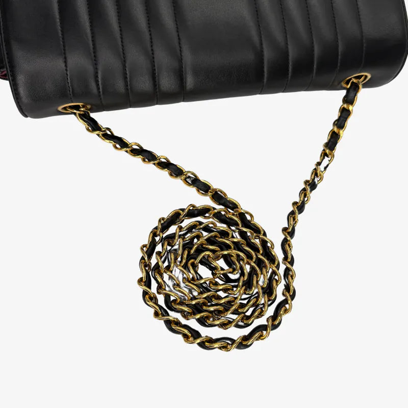RG014 - CHANEL Vintage Black Lambskin Vertical Flap Bag