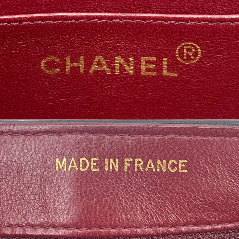 RC469 - CHANEL Vintage Black Lambskin Chevron Push Lock Flap Bag