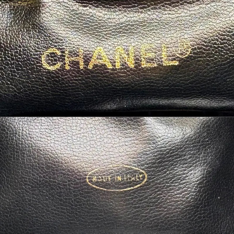JW675 - CHANEL Vintage Black Caviar Leather Golden Ball Bucket Bag