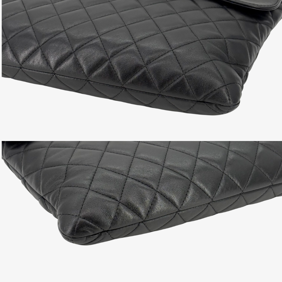RG370 - CHANEL Vintage Black Lambskin Zip And Flap Clutch Bag