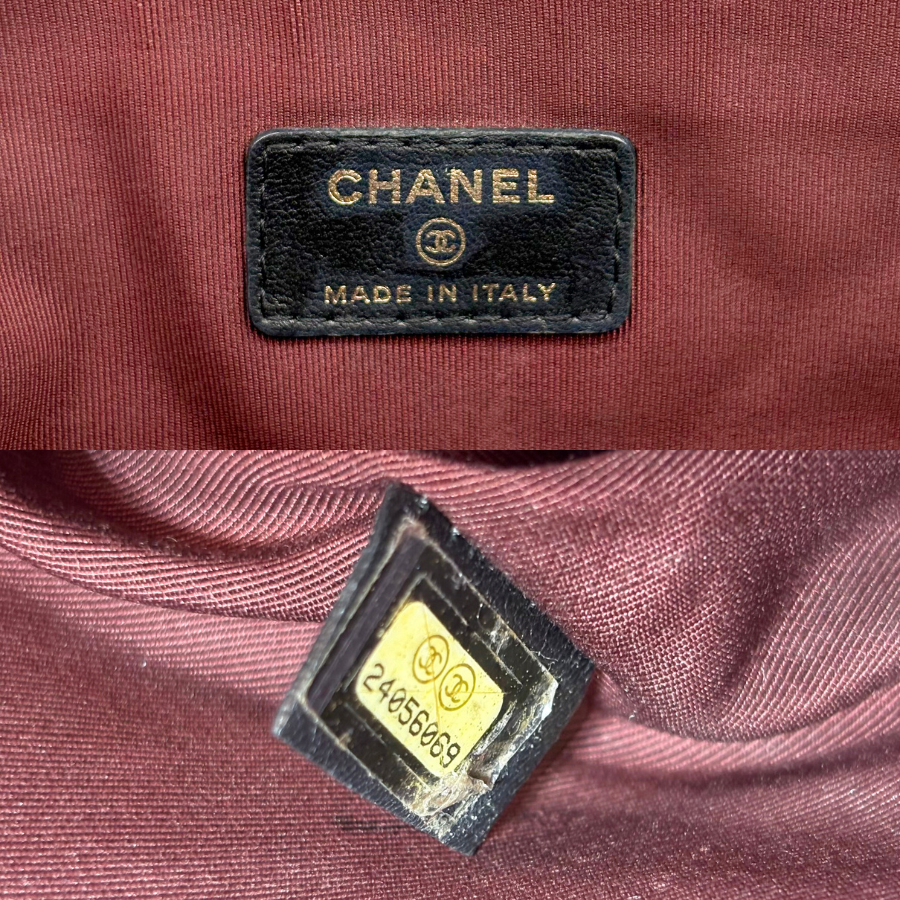 RG370 - CHANEL Vintage Black Lambskin Zip And Flap Clutch Bag
