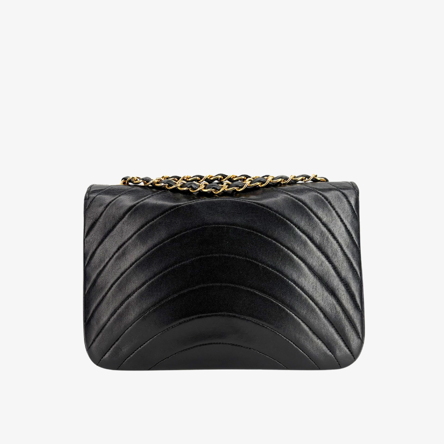 CS004 - CHANEL Vintage Black Lambskin Half Moon Wave Flap Bag